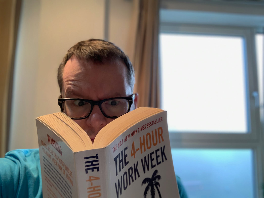 Alan reading the four hour work week by Tim Ferriss