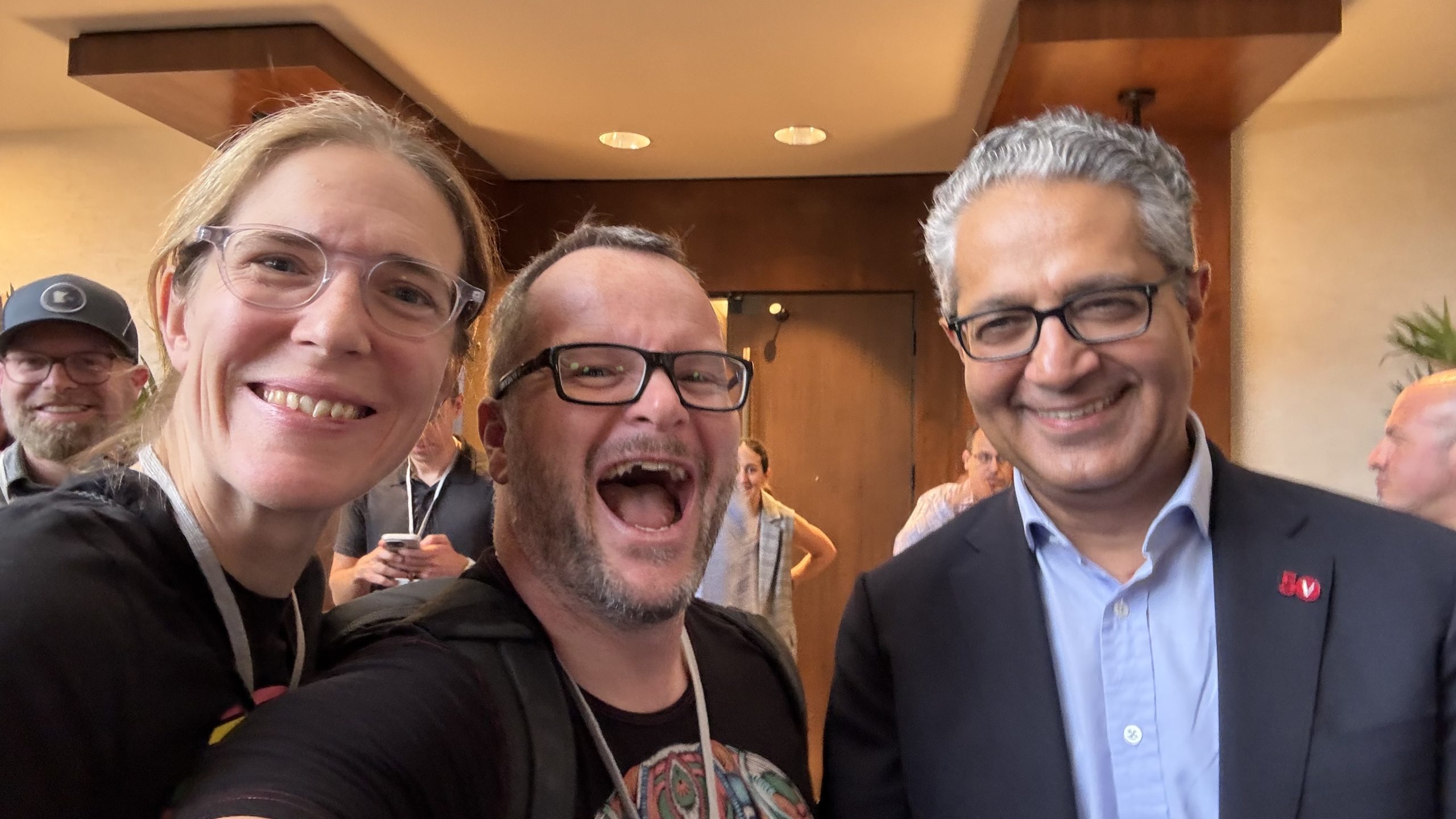 Selfie of Alan and Katie Donegan with Vanguard CEO Salim Ramji at Bogleheads Conference 2025, smiling together after a keynote session.