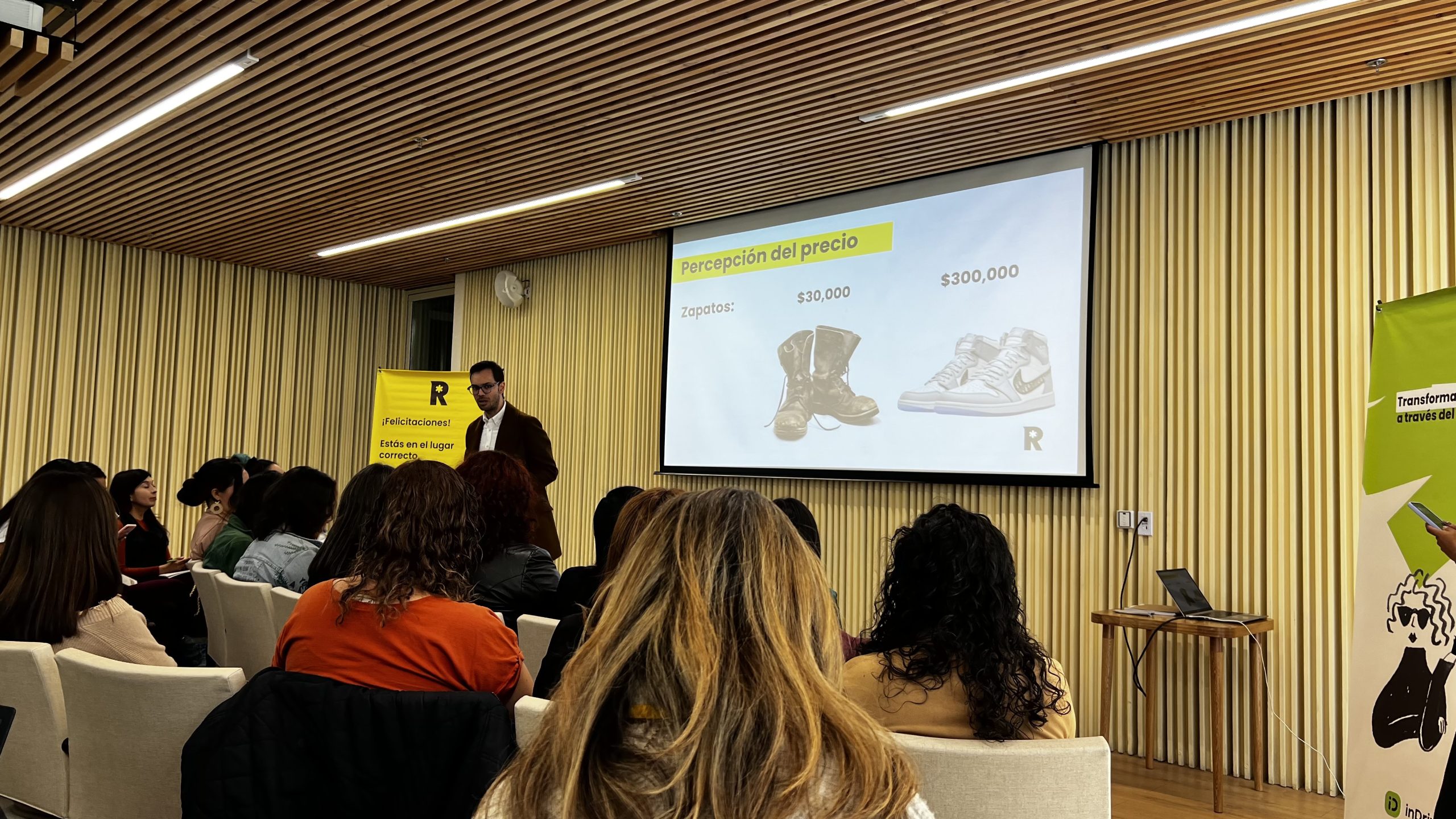 Dani Angel presenting at Indrive x Rebel Business School Colombia event Dani Angel presenting to an audience at the Indrive and Rebel Business School Colombia entrepreneurship event
