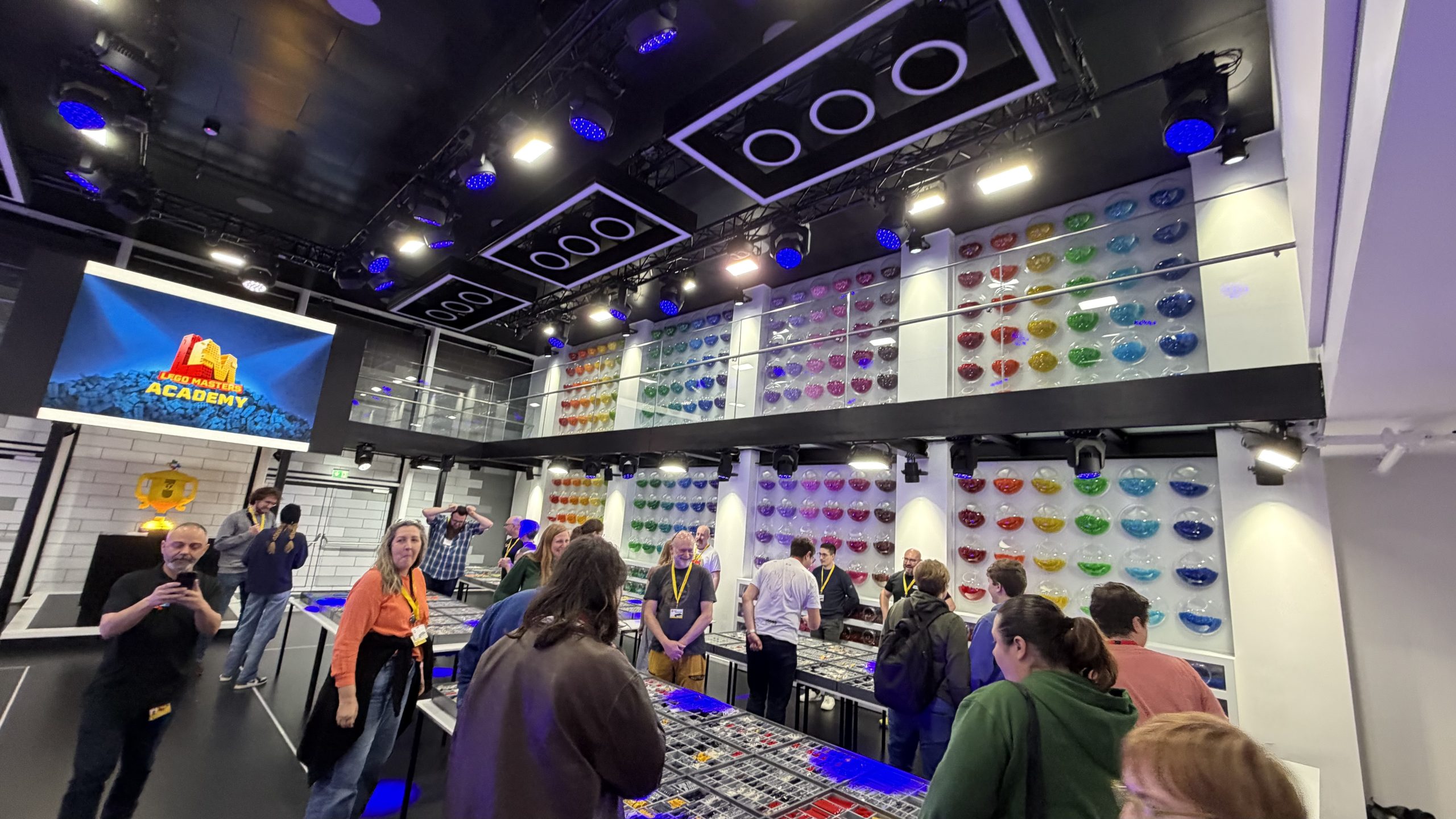 Participants gathering in the LEGO Masters room at LEGO House in Billund before the LEGO design challenge